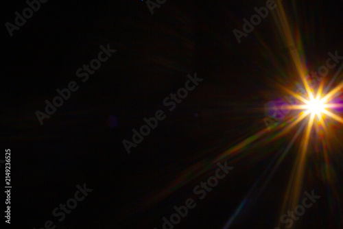 Sun flare on the black background