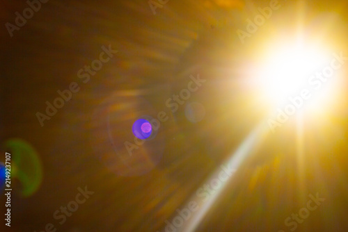 Sun flare on the black background