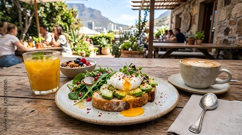 Breakfast with eggs, vegetables, and beverages on a rustic table
