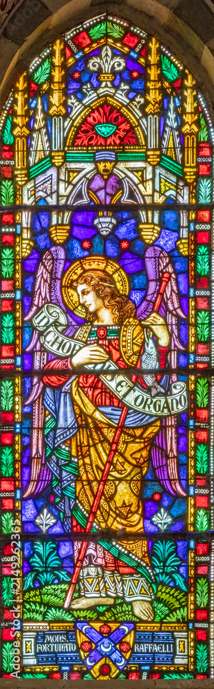 Obraz premium PISA, ITALY - JUNE 25, 2026: The St. Archangel Raphael from the stained glass in the church Chiesa di Santa Caterina by Königliche Bayerische Hofglasmalerei F. X. Zettler (1922 - 1924)