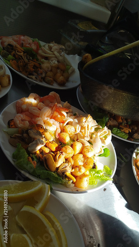 Cooking homemade food in pan on professional kitchen