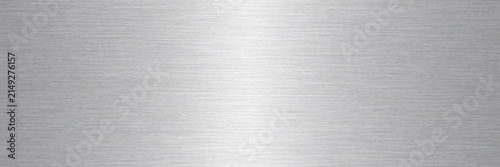 Brushed aluminum metal texture background, silver stainless steel surface with light reflection, industrial metallic plate material for web design, sleek chrome finish for product display