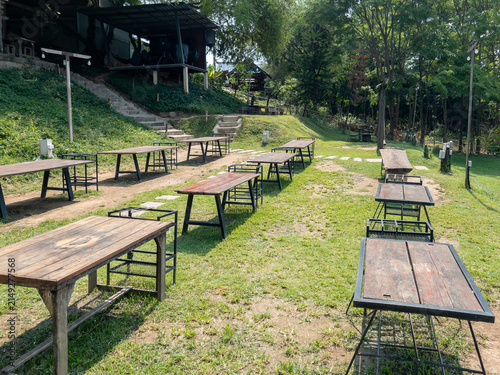 Outdoor Garden Cafe Seating Area with Wooden Tables