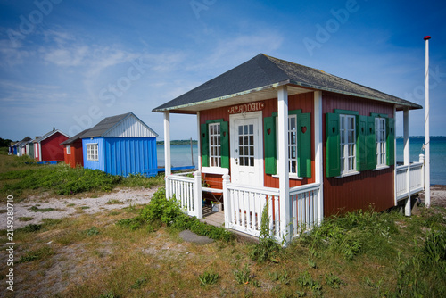 Charming colorful coastal bathing houses in Ærøskøbing, Denmark