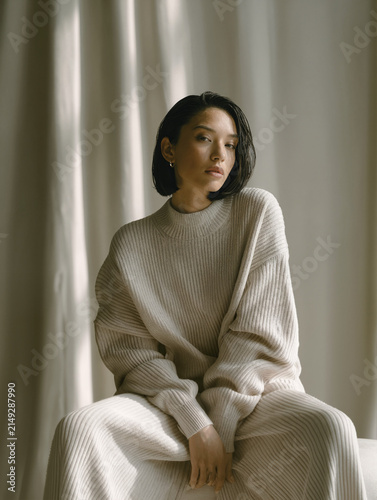Young Woman Posing in Ribbed Knit Sweater