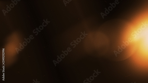 golden light leak overlay with cinematic lens flare and soft glowing bokeh effect on dark background