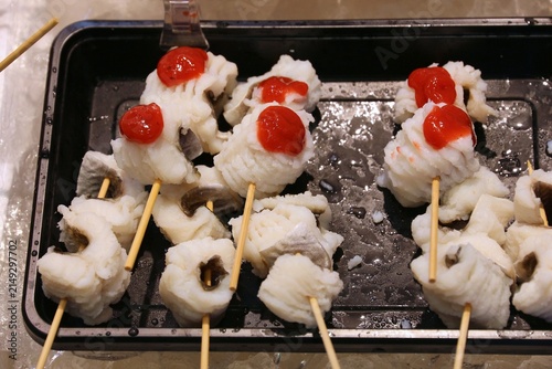 Fotografie Japanese cuisine - conger eel skewers with plum sauce