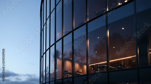 Modern Office Building Glass Facade Illuminated at Dusk