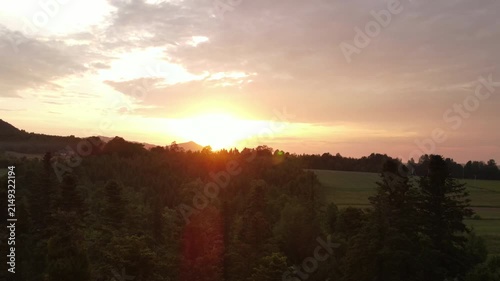 Inspirational epic drone view of beautiful mountains during warm summer sunset or sunrise. Outdoors lifestyle for healthy and fresh air. Wanderlust destination and nature concept