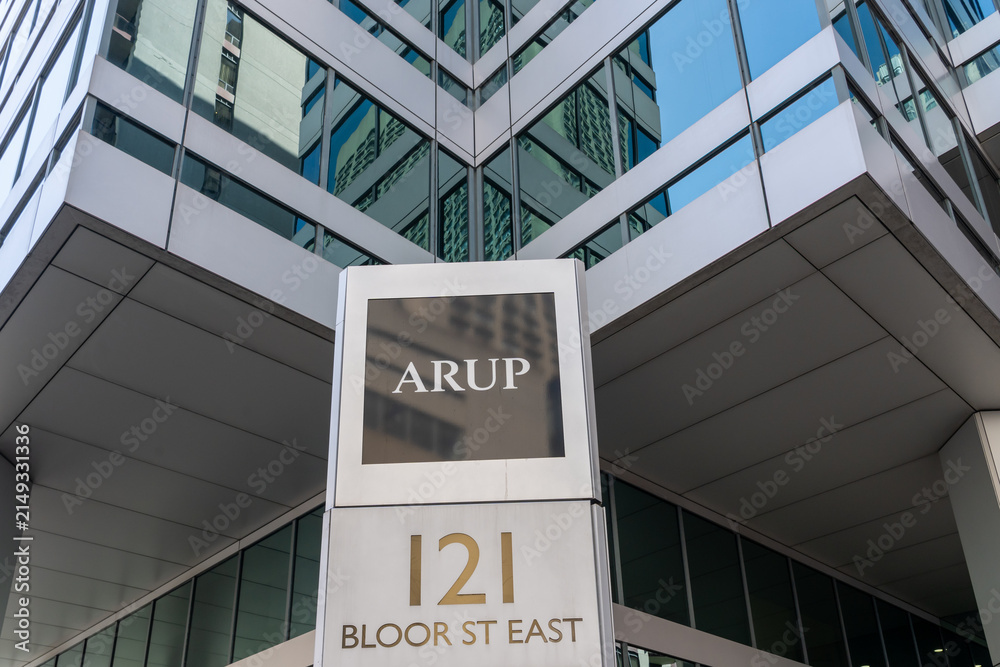 Fototapeta premium Toronto, Canada - August 5, 2026: A closeup sign of Arup at their office on Bloor Street E in downtown Toronto, Canada. Arup Group Limited is a British multinational professional services firm special