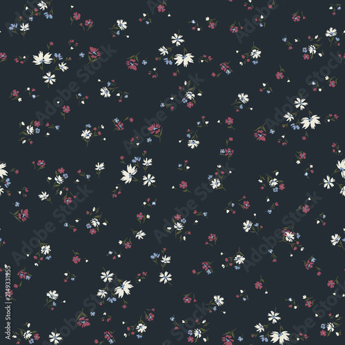 Delicate floral pattern with small white and pink blossoms scattered on a dark navy background for fabric design
