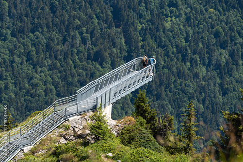 The Pas de l'Aigle at the Pointe de Nyon in Morzine, France, is a 15-meter glass and steel footbridge suspended at 2,019 meters altitude.