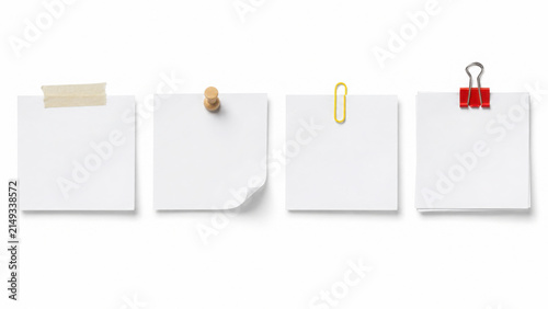Blank sticky notes with clips and pins on white background