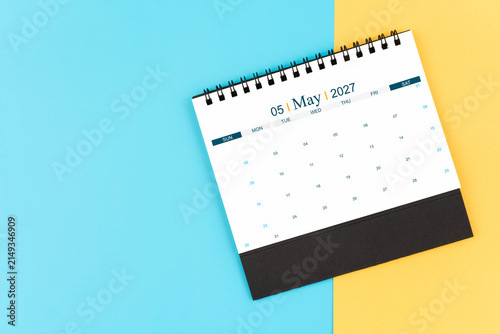 May 2027 desk calendar on blue and yellow, planning for business meeting or planning concept.