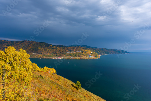 Autumn hills frame calm, deep-blue lake Baikal