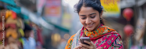 young indian woman using mobile phone
