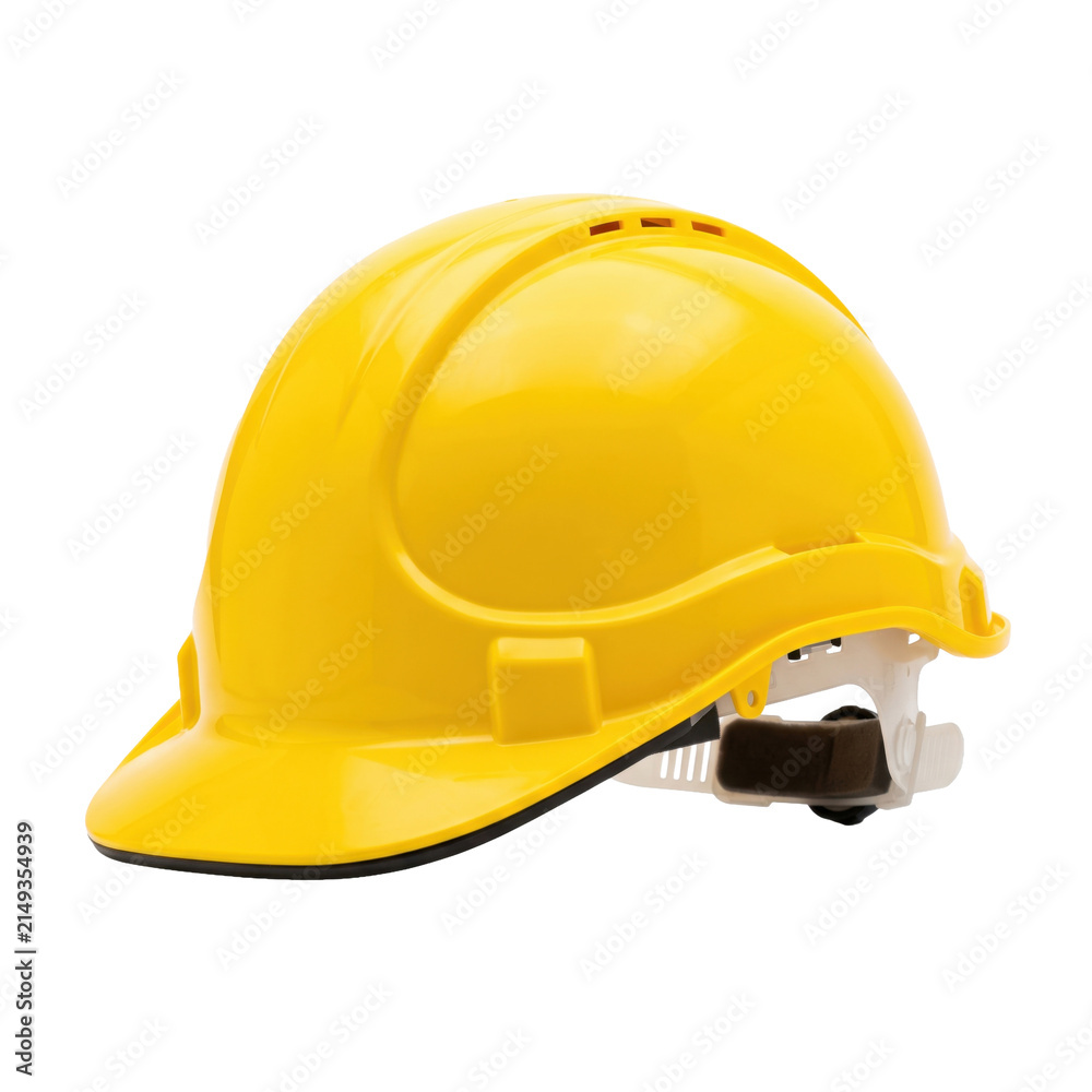 Fototapeta premium Bright yellow hard hat for construction and industrial safety protection