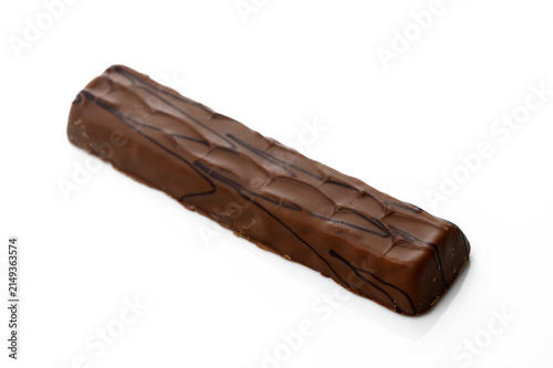 Fotografie Indulging in sweet delight with a rich chocolate candy bar waiting to be enjoyed