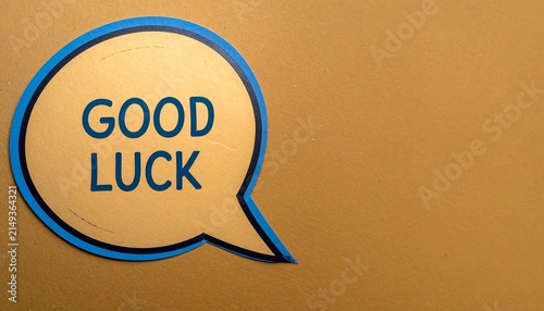Good Luck Speech Bubble Artwork Bold Blue Typography White Interior Dark Textured Background Encouraging Message Positive Motivation Decorative Design