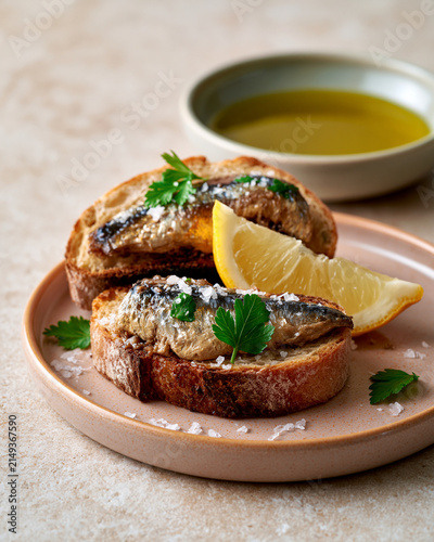 Mediterranean sardine toast with rustic bread olive oil lemon parsley and sea salt showcasing elevated pantry meal and cultural food storytelling