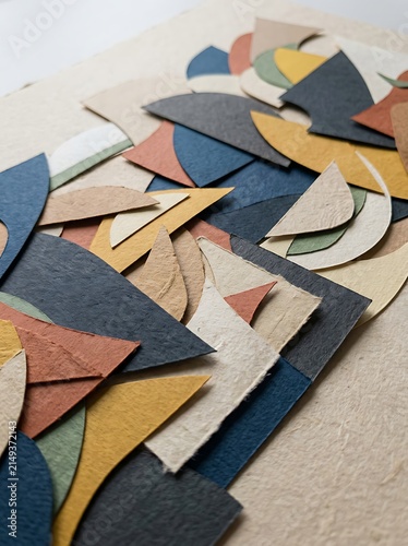 Colorful Paper Cutouts Arranged in Abstract Composition.