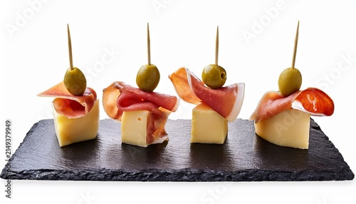 Isolated Canape With Cheese Olive And Serrano Ham
