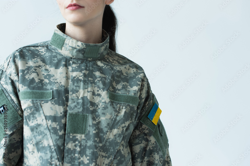 Obraz premium Strong spirit of freedom shines through in young Ukrainian soldier on Independence Day