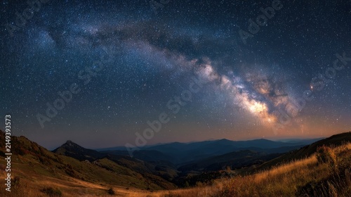 Night sky milky way galaxy over mountain range landscape scene