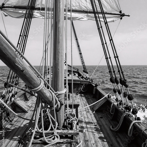 Black And White Ink Crow Tower. A Weathered Wooden Sailing Ship With A Crow'S Nest And Detailed Rigging