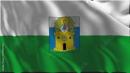 Flag of Medellín waving slowly in the foreground.
