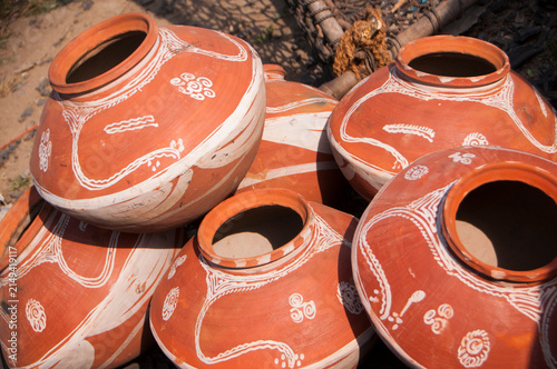 Photography Earthen pot being made using potter's wheel, India