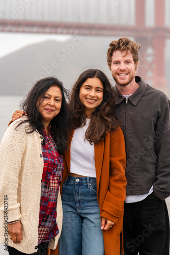 posed portrait together outside smiling at camera