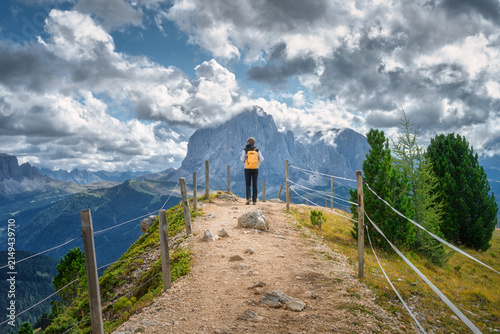 Woman hiker with yellow bac...