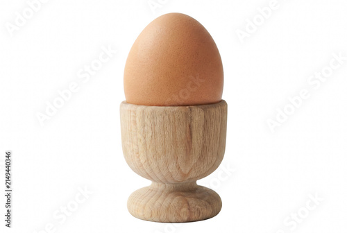 Konstfotografi Single Brown Egg in a Wooden Egg Cup