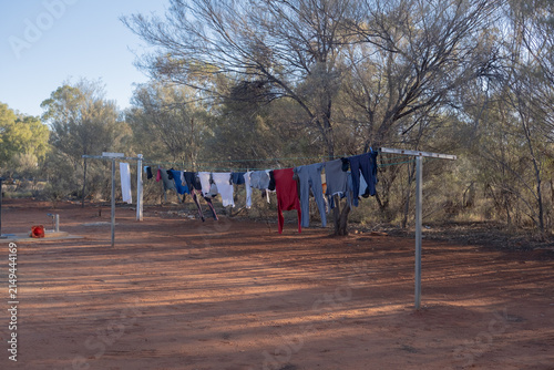 Obraz na płótnie Drying clothes hang on a wire rack