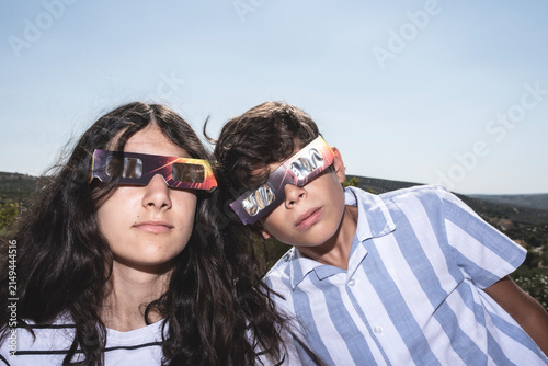 Children Wearing Protective Glasses During a Solar Eclipse
