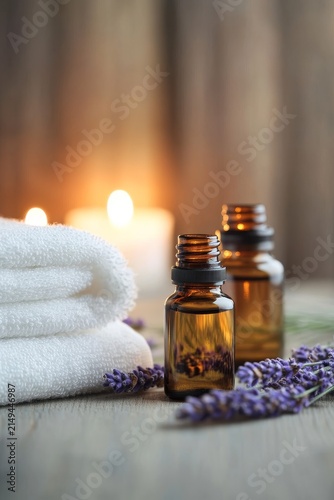 Aromatherapy relaxation with lavender essential oil, soft towel and candle