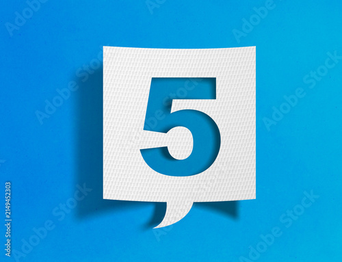 Number five speech bubble on blue background with paper cutout design