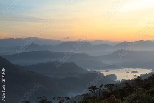 Misty Mountain Range with Lake at Sunrise from Adam's Peak