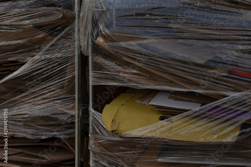Canvastavla Stacked cardboard wrapped in plastic film, industrial recycling hub palletized f