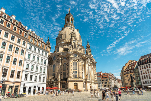 Dresden Frauenkirche and busy Neumarkt square with people, Saxony, Germany