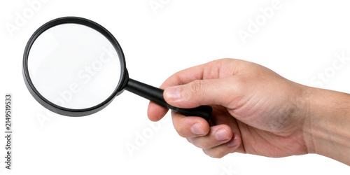 Canvastavla Man's hand holding a magnifying glass with bright lighting for close examination