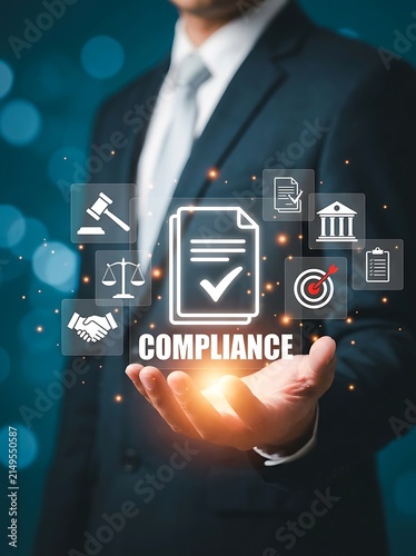 Corporate compliance concept with businessman holding holographic document and legal icons for business regulatory adherence and safety