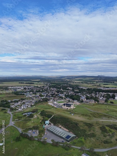 Dornoch is a historic Highland town in northern Scotland, with 1224 cathedral origins, 1509 castle, traditional streets, green landscapes, and open skies.