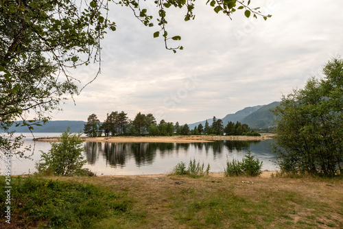 Bild auf Leinwand Evening reflections on Lake Totak, Rauland, Telemark, Norway