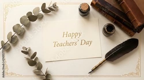 A beautiful greeting card for happy teachers day with vintage books and a quill pen on a desk