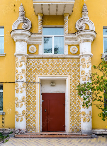 Ornate Entrance with Decorative Columns on a Soviet Residential Building in Kyiv