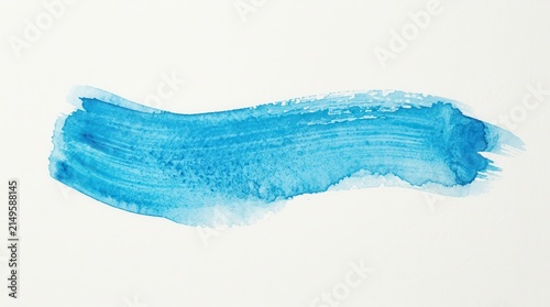 Blue watercolor stain brush strokes with texture on a white background.