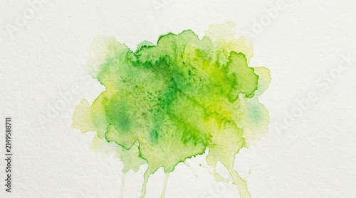 Green grass watercolor stain on white background.
