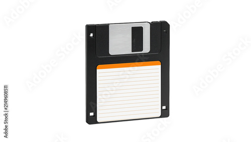 Vintage 3.5 inch floppy disk with white label for data storage isolated on a plain black background studio isolated on a transparent background